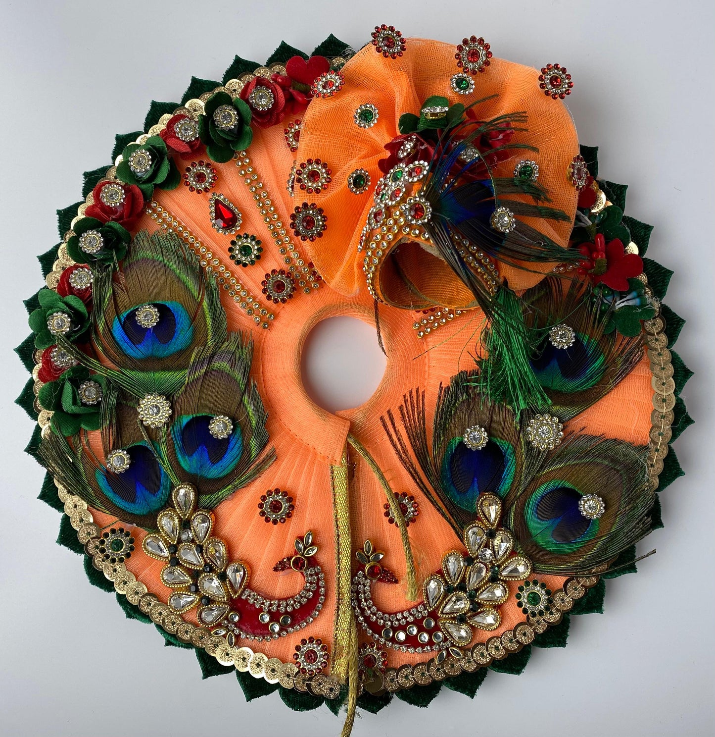 Orange with peacock feather