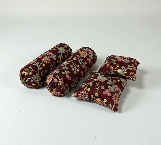 Maroon floral pillow